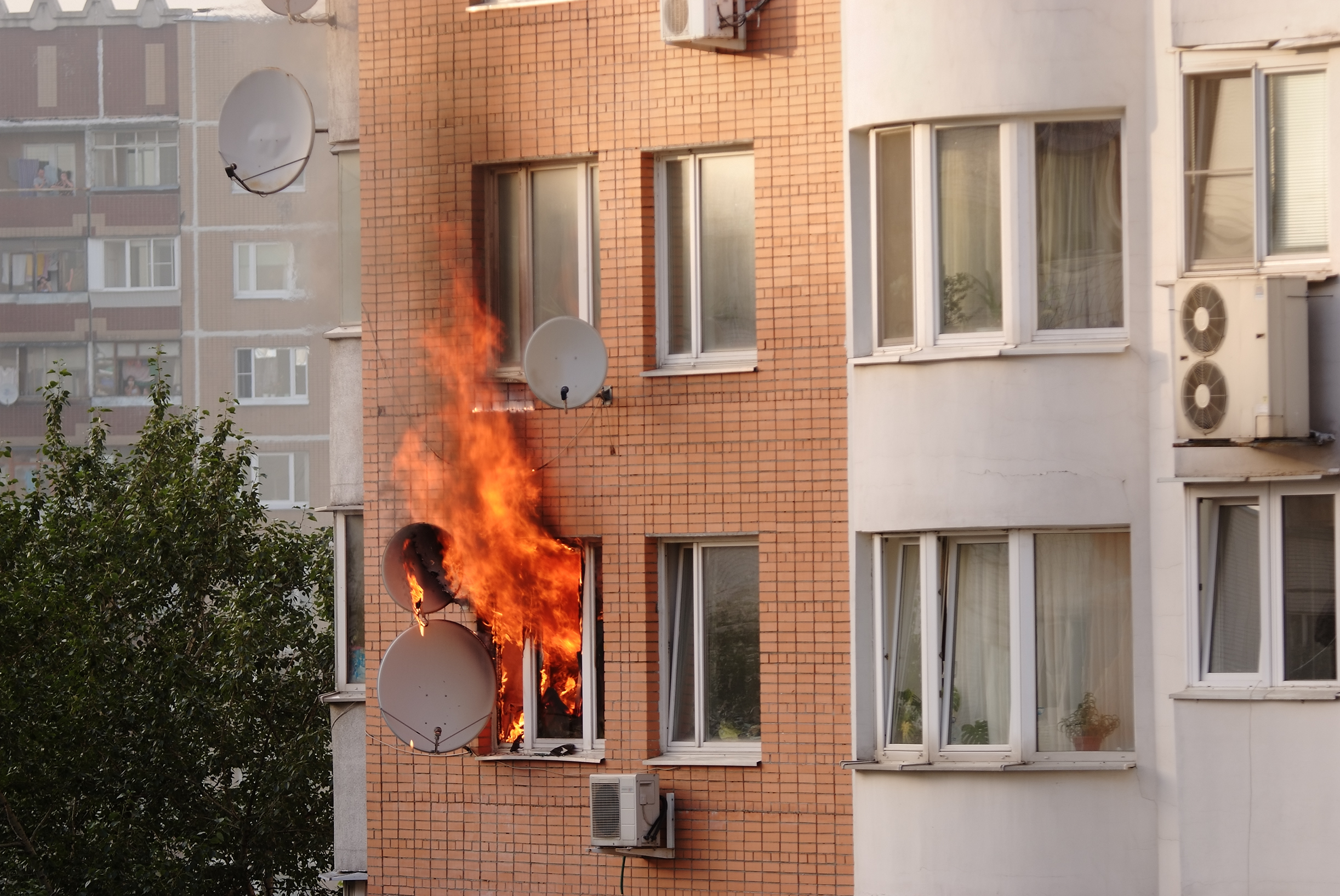 Apartment building engulfed in flames